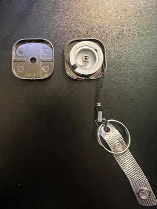 Heavy duty badge reel disassembled